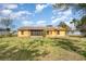 Exterior of home displaying a large backyard at 3186 Mapleshade St, Deltona, FL 32738