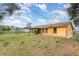 Exterior of home displaying large backyard at 3186 Mapleshade St, Deltona, FL 32738