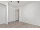 Bedroom featuring neutral walls, stylish flooring, and a door that leads to the closet at 3186 Mapleshade St, Deltona, FL 32738
