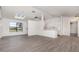 Spacious living area featuring a skylight, new flooring, neutral paint, and an open concept at 3186 Mapleshade St, Deltona, FL 32738
