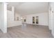 Bright and airy living room features neutral paint, new flooring, and natural light at 3186 Mapleshade St, Deltona, FL 32738