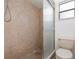 The bathroom features a tiled standing shower and a toilet next to the shower at 3186 Mapleshade St, Deltona, FL 32738