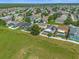 Aerial view of houses and community at 525 Aster Dr, Davenport, FL 33897