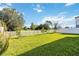 Spacious backyard with a white picket fence at 720 Split Hoof Dr, Saint Cloud, FL 34771