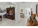 Bright hallway with built-in shelving and views into other rooms at 720 Split Hoof Dr, Saint Cloud, FL 34771