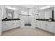 Bright bathroom featuring a frameless shower, dual sinks, and modern finishes at 13163 Mcmillan Dr, Orlando, FL 32827