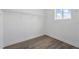 Walk-in closet with laminate floors and custom shelving for ample storage at 13163 Mcmillan Dr, Orlando, FL 32827