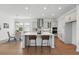 Bright kitchen with a large center island, stainless steel appliances, and breakfast bar seating at 13163 Mcmillan Dr, Orlando, FL 32827
