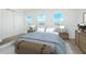 Comfortable bedroom features natural light, neutral decor and generous closet space at 13163 Mcmillan Dr, Orlando, FL 32827