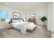 Spacious main bedroom with stylish furnishings, natural light, and decor at 13163 Mcmillan Dr, Orlando, FL 32827