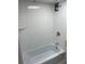 Clean bathroom with a shower/tub combo and updated vanity at 151 E Washington St # 604, Orlando, FL 32801