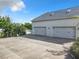 Spacious three-car garage with extra long driveway at 226 Mitnik Dr, Deltona, FL 32738
