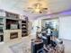 Music room with fireplace, shelving, and drum set at 226 Mitnik Dr, Deltona, FL 32738