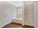 Bathroom featuring a tub, shower and a beige neutral color palette at 1103 Epson Oaks Way, Orlando, FL 32837
