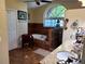 Bathroom featuring a soaking tub, tiled shower, granite countertop vanity with dual sinks, and a large window at 10161 Culpepper Ct, Orlando, FL 32836