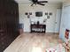 Comfortable bedroom with a console table and plenty of storage in built-in cabinets at 10161 Culpepper Ct, Orlando, FL 32836