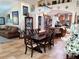 Open-concept dining room connecting to the kitchen and living areas, ideal for Gathering meals and entertaining at 10161 Culpepper Ct, Orlando, FL 32836