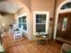 Inviting front porch with comfortable seating and decorative touches creating a welcoming entrance to the home at 10161 Culpepper Ct, Orlando, FL 32836
