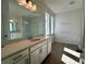 Bathroom with a large vanity and a frameless glass shower at 329 Lady Palm St, Apopka, FL 32703