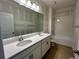 Bright bathroom with double vanity and bathtub at 329 Lady Palm St, Apopka, FL 32703