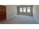 Spacious bedroom with ample closet space and neutral carpeting at 329 Lady Palm St, Apopka, FL 32703