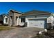 Beautiful two-story home with stone accents at 329 Lady Palm St, Apopka, FL 32703