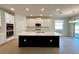 Modern kitchen featuring a large island and stainless steel appliances at 329 Lady Palm St, Apopka, FL 32703