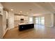 Modern kitchen with island and tile flooring at 329 Lady Palm St, Apopka, FL 32703