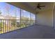Spacious screened balcony overlooks trees and homes at 5058 Maxon S Ter # 108, Sanford, FL 32771