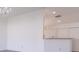 Kitchen features white cabinets and a breakfast bar at 5058 Maxon S Ter # 108, Sanford, FL 32771