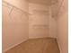 Spacious walk-in closet with wire shelving at 5058 Maxon S Ter # 108, Sanford, FL 32771