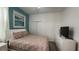 Cozy bedroom featuring double bed, soft carpet, and serene interior design at 2621 Calistoga Ave, Kissimmee, FL 34741