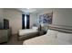 Comfortable bedroom featuring two beds, stylish decor, and plenty of space at 2621 Calistoga Ave, Kissimmee, FL 34741