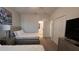 A bedroom showcases two beds, a connecting bathroom, and ample closet space at 2621 Calistoga Ave, Kissimmee, FL 34741