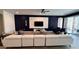 Open-concept living room featuring a modern design with stylish furniture and decor at 2621 Calistoga Ave, Kissimmee, FL 34741