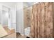 Bathroom with white vanity, a bathtub, and a separate shower at 8162 Lazy Bear Ln, Winter Park, FL 32792