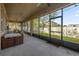 Spacious screened porch, perfect for relaxing and enjoying the outdoors at 8162 Lazy Bear Ln, Winter Park, FL 32792