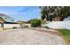 The backyard features a paved patio area, privacy fence, and garden at 1278 Snug Harbor Dr, Casselberry, FL 32707