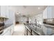 Bright kitchen featuring a large center island and easy flow into the dining and living spaces at 1278 Snug Harbor Dr, Casselberry, FL 32707