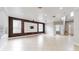 Expansive living room area with multiple windows and tile floors at 1278 Snug Harbor Dr, Casselberry, FL 32707
