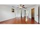 Large bedroom featuring hardwood floors, ceiling fan and natural light at 1278 Snug Harbor Dr, Casselberry, FL 32707