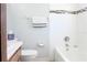 Bright bathroom with a white tiled shower-tub and a modern vanity at 1017 Mabbette St, Kissimmee, FL 34741