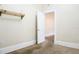 View of a bedroom with neutral paint, neutral carpet, and white trim at 1017 Mabbette St, Kissimmee, FL 34741