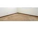 View of an empty bedroom with neutral paint, carpet, and trim at 1017 Mabbette St, Kissimmee, FL 34741