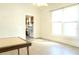 Well-lit living room featuring a large window with a view and access to the kitchen at 1017 Mabbette St, Kissimmee, FL 34741