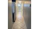 Hallway with tile floor leading to rooms, kitchen and bathroom at 2906 Fox Squirrel Dr # 41, Kissimmee, FL 34741