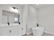 Bathroom featuring modern fixtures, dual sinks, and a freestanding tub at 4683 Sw 136Th St, Ocala, FL 34473
