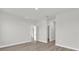 Spacious bonus room boasts versatile space and modern wood-look flooring at 4683 Sw 136Th St, Ocala, FL 34473