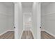 Large walk-in closet providing ample storage space with shelving and rods at 4683 Sw 136Th St, Ocala, FL 34473