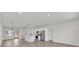 Open concept living space features a kitchen with an island and stainless steel appliances at 4683 Sw 136Th St, Ocala, FL 34473